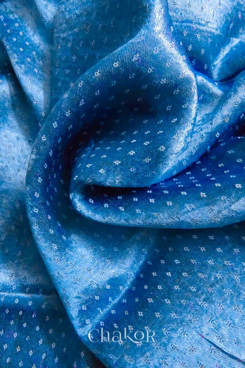 Close up of Handcrafted Blue grey Mashru Blouse Fabric with self woven design and silky texture.